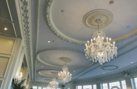 glass chandeliers in room